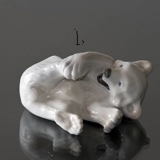 Polar Bear playing with its foot, Royal Copenhagen figurine no. 729