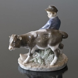 Boy walking to the field with Calf, Royal Copenhagen figurine no. 772
