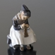 Amager Girl, Sowing while in Regional Costume, Royal Copenhagen figurine no. 1314 or 097
