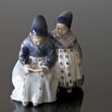 Amager Girls, Reading while in Regional Costume, Royal Copenhagen figurine no. 1395