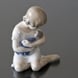Girl with Doll in her Arms, Royal Copenhagen figurine no. 1938 or 121