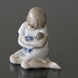 Girl with Doll in her Arms, Royal Copenhagen figurine no. 1938 or 121