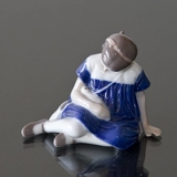 Girl with Doll sitting on her side, Bing & Grondahl figurine no. 1526
