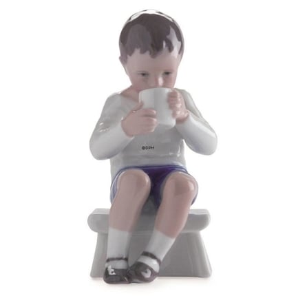Victor, boy drinking a nice glass of milk, Bing & Grondahl figurine no. 1713 or 418