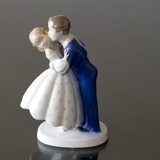 Youthful Boldness, Boy stealing a kiss from Girl, Bing & Grondahl figurine no. 2162
