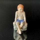 Jens sitting on a rock, The little beach lion, Royal Copenhagen figurine