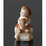Pixie on Sleigh with a teddy bear, Royal Copenhagen Christmas figurine