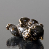 Bear Cub lying down playing, Royal Copenhagen stoneware figurine no. 21432