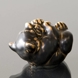 Bear Cub lying down bitting its foot, Royal Copenhagen stoneware figurine no. 21434 or 234