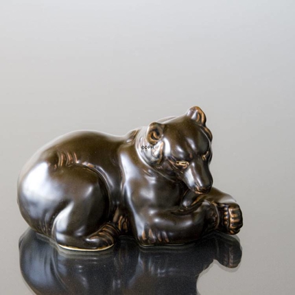 Bear lying comfortably, Royal Copenhagen stoneware figurine no. 21520 or 238