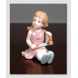 Maria Girl cutting her hair, From the series of mini children from Royal Copenhagen, figurine no. 013