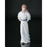 Lady Walking with Hat Behind Her, Royal Copenhagen figurine in the series Scandinavian women