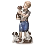 Boy with puppies, Royal Copenhagen figurine