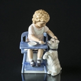 Girl feeding dog, Royal Copenhagen figurine