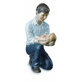 Father with sleeping baby on his knee, Royal Copenhagen figurine