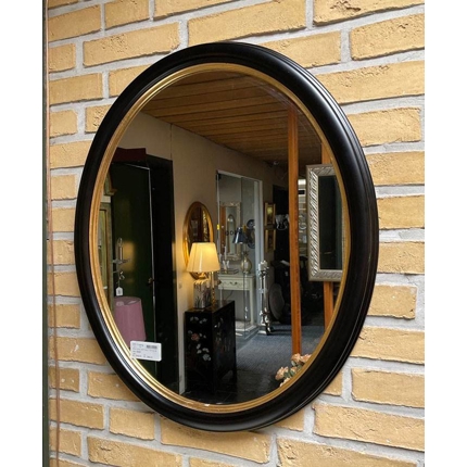 Oval spejl i sort med guldkant