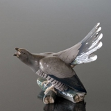 Cuckoo sitting on branch screeching, Bing & Grondahl bird figurine no. 1020423 / 1770
