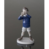 Boy blowing his trumpet, Bing & Grondahl figurine No. 1792