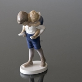 Boy carrying girl on his back, Bing & Grondahl figurine no. 1848