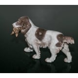 Apporting Cockerspaniel bringing back the prey, Bing & Grondahl dog figurine No. 2061