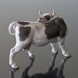 Cow licking its back, Bing & Grondahl figurine no. 446 or 2161
