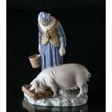 Woman with pig, Bing & Grondahl figurine