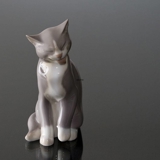 Cat sitting and cleaning itself, Bing & Grondahl cat figurine No. 2256