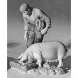 Farmer with pig, Bing & Grondahl figurine