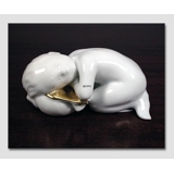 Seaboy resting, gold decorated Bing & grondahl figurine