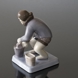 Greenlandish woman with bucket pouring water in, Bing & Grondahl figurine No. 2416