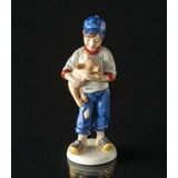 Boy with piglet, Bing & Grondahl annual figurine 2003
