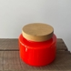 Holmegaard Orange Palette storage jar with text "Ost" (Cheese) Design Michael Bangg