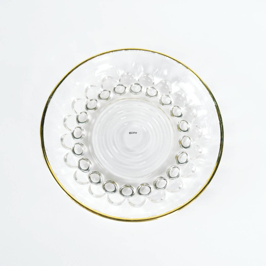 Lille fin glasasiet med slibninger i bunden og guldkant