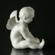 Angel/Cupid playing with his foot, figurine Dahl Jensen