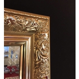 Facet cut mirror in golden flat and shiny finish