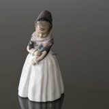 Amager Girl, Girl in regional costume looking shy, Royal Copenhagen figurine no. 1021093 / 1251