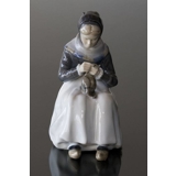 Amager Girl, sowing in regional costume, Royal Copenhagen figurine no. 1021099 / 1317