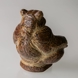 Bear sitting playfully, Royal Copenhagen stoneware figurine No. 21458