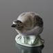 Partridge curving its neck, Royal Copenhagen bird figurine No. 2261