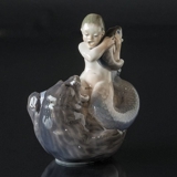 Mermaid, faun riding on seal with fish, Royal Copenhagen figurine