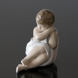 Rosebud sitting curling together, Royal Copenhagen child figurine No. 3009