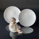 Rosebud sitting curling together, Royal Copenhagen child figurine No. 3009