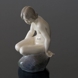 Girl on stone looking down, Royal Copenhagen figurine No. 4027