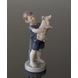 Boy with piglet, August, Royal Copenhagen monthly figurine no. 4530