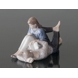Teenagers reading closely together, Royal Copenhagen figurine No. 4649