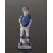 Boy playing football, Royal Copenhagen figurine no. 5657