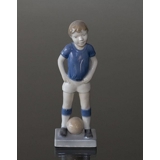 Boy playing football, Royal Copenhagen figurine