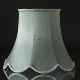 Octagonal lampshade with curves height 22 cm, light green coloured silk fabric