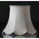 Octagonal lampshade with curves height 30 cm, covered with off white silk fabric