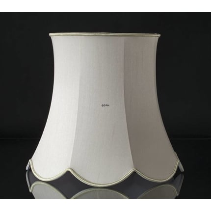 Octagonal lampshade with curves height 42 cm, covered with off white silk fabric
